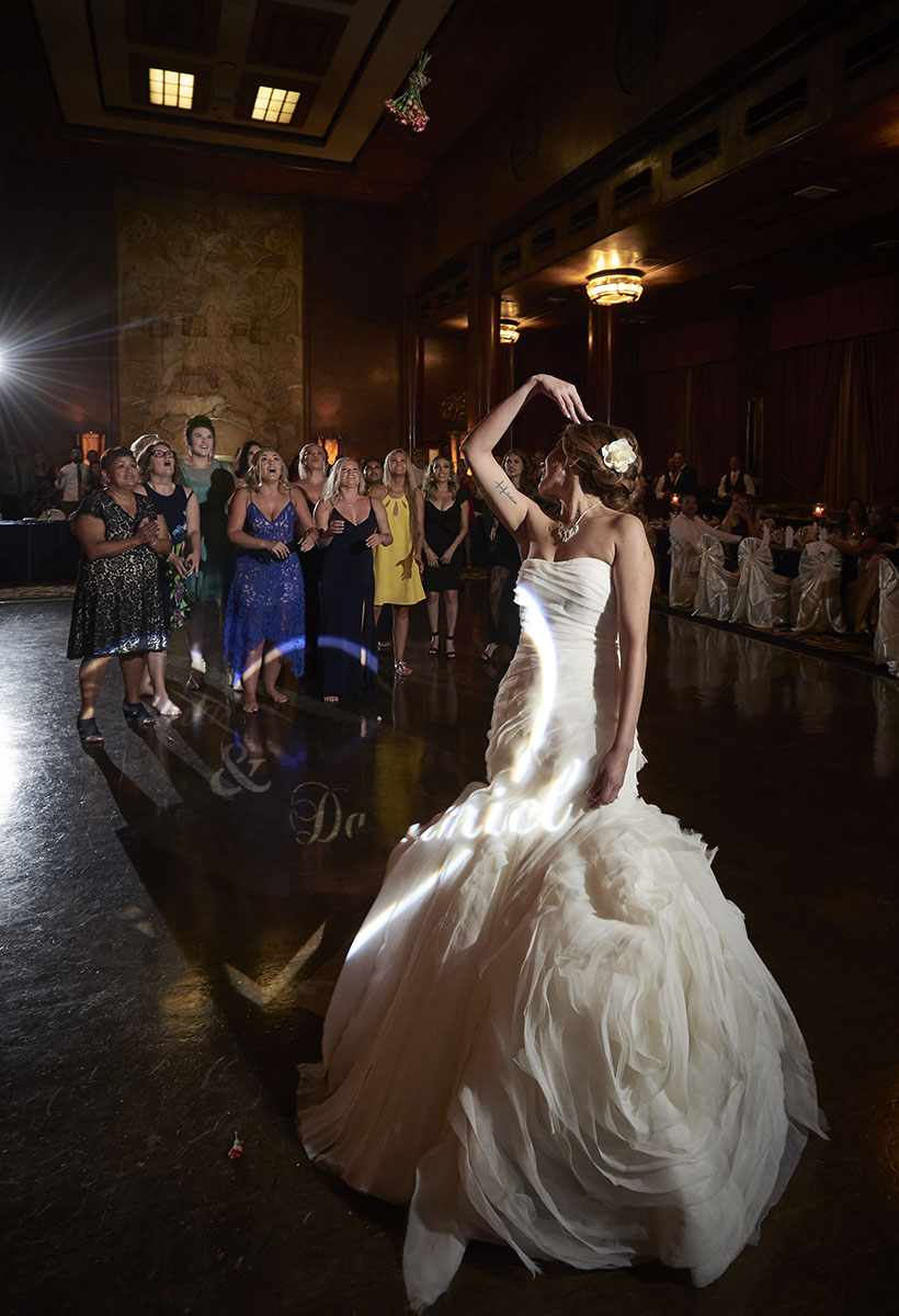 bouquet-toss-queen-mary-ballroom-long-beach-wedding-reception