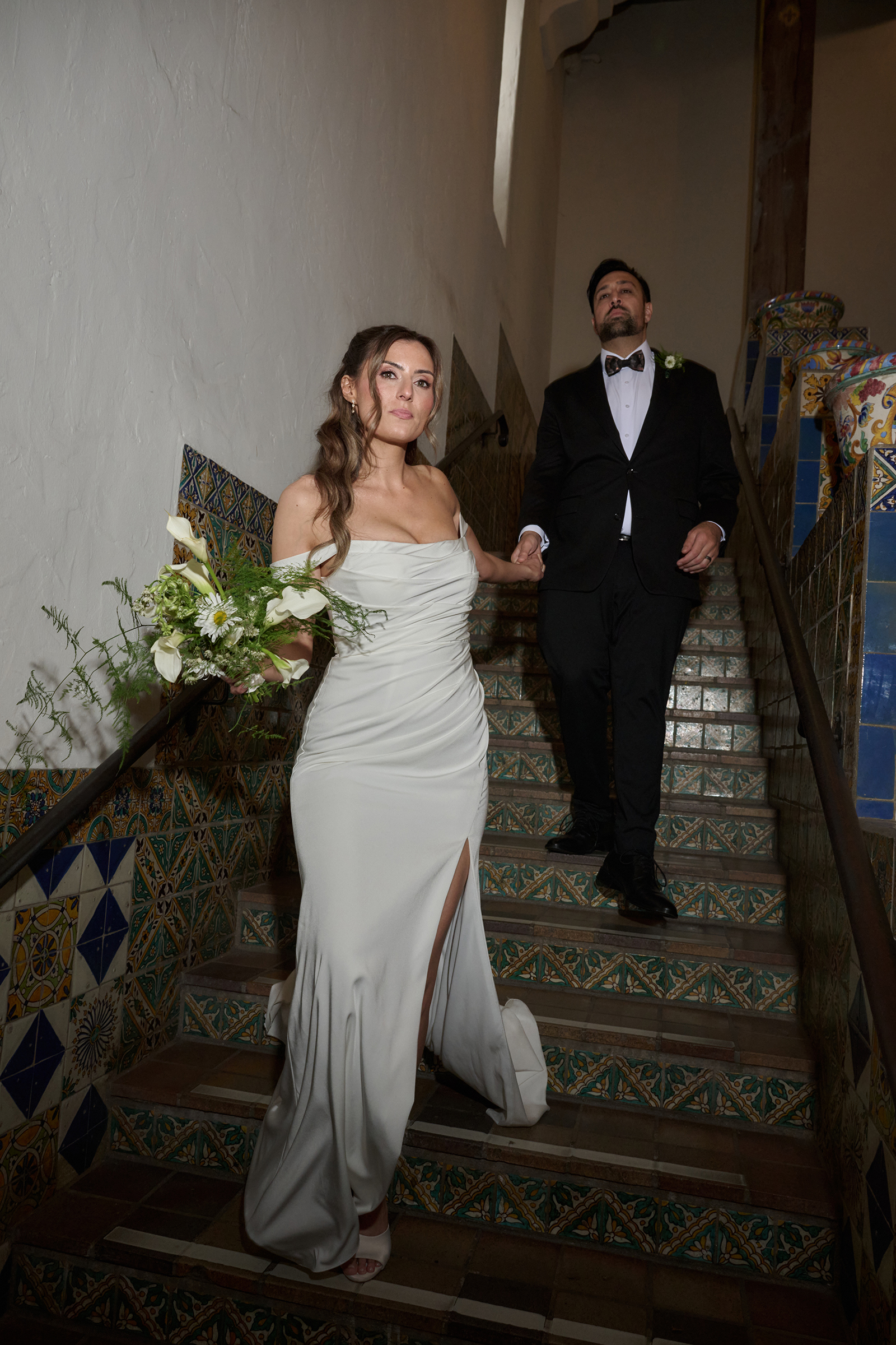 bride-groom-staircase-santa-barbara-courthouse-wedding-photography