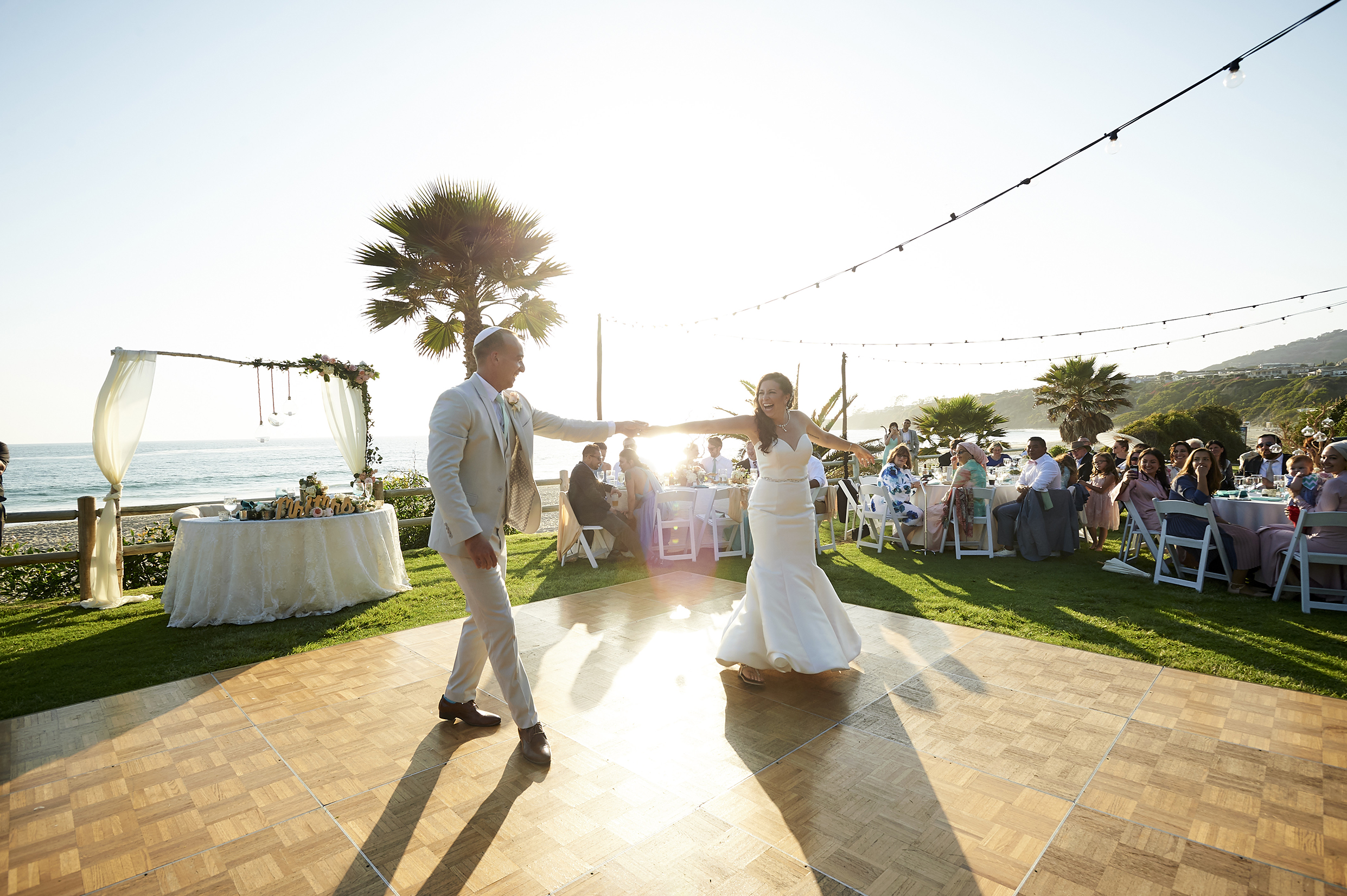 first-dance-sunset-montage-laguna-beach-oceanfront-wedding-reception